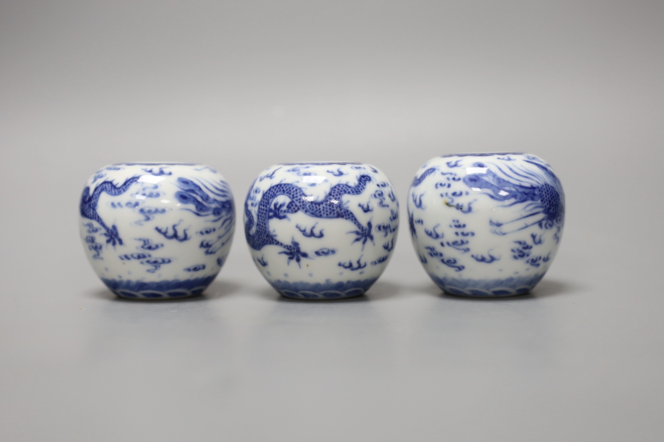 Three Chinese blue and white 'dragon and phoenix' waterpots, probably Republic period, 6cm